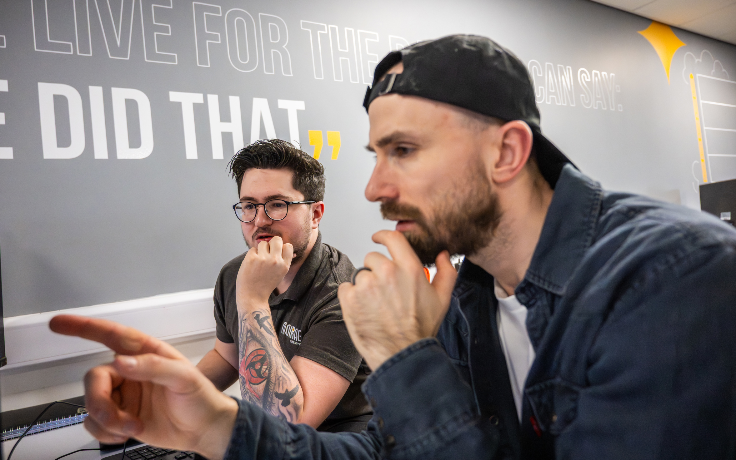 SEO Specialists discussing strategy