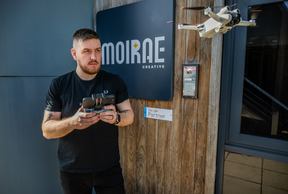 Drone Photographer capturing footage