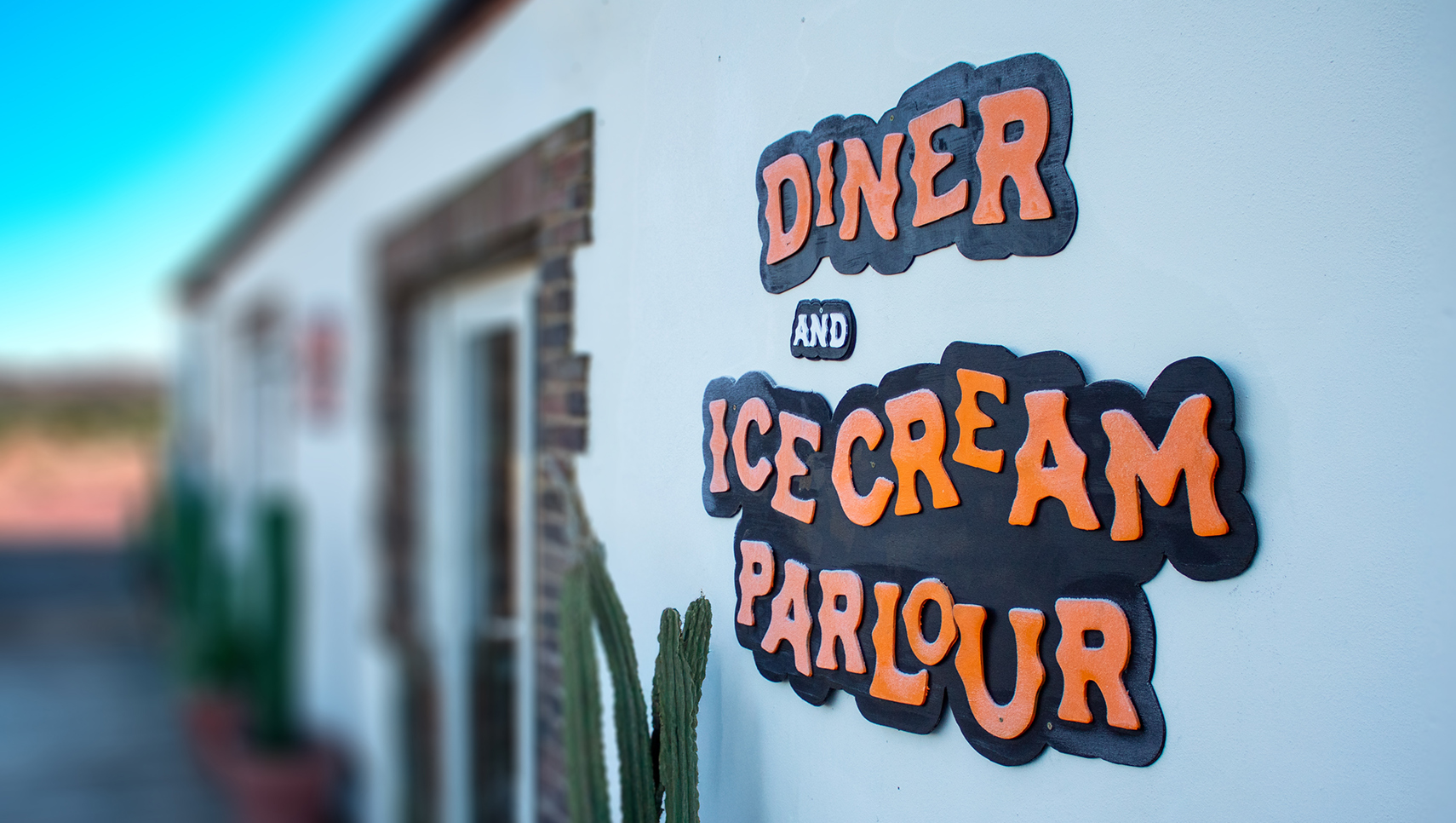 Photography of Restaurant Signage at Country Park
