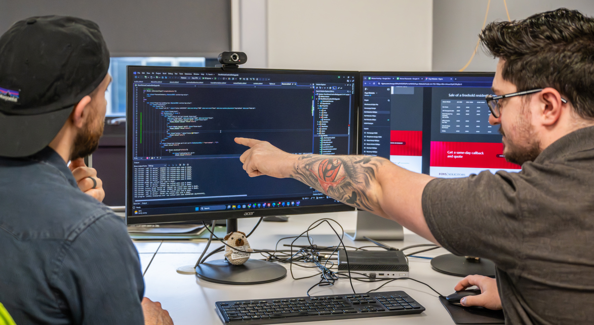 Web Marketer demonstrating code