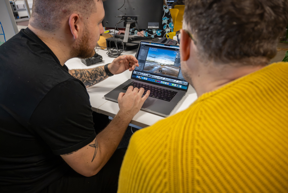Photographer showing portfolio